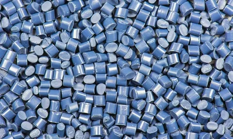 A close up of some blue plastic pellets